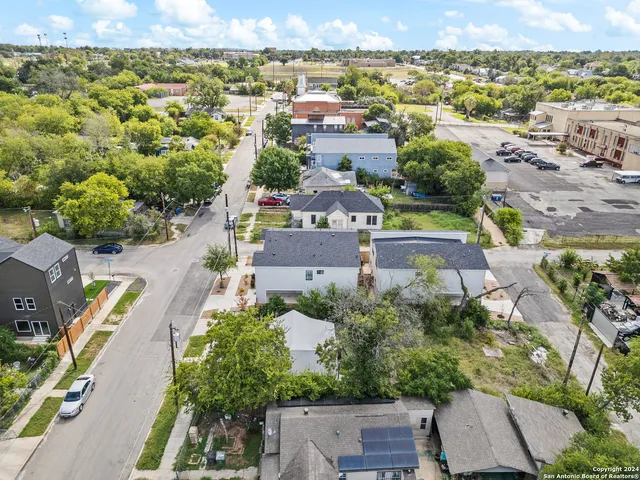 an aerial view of a city with lots of residential buildings