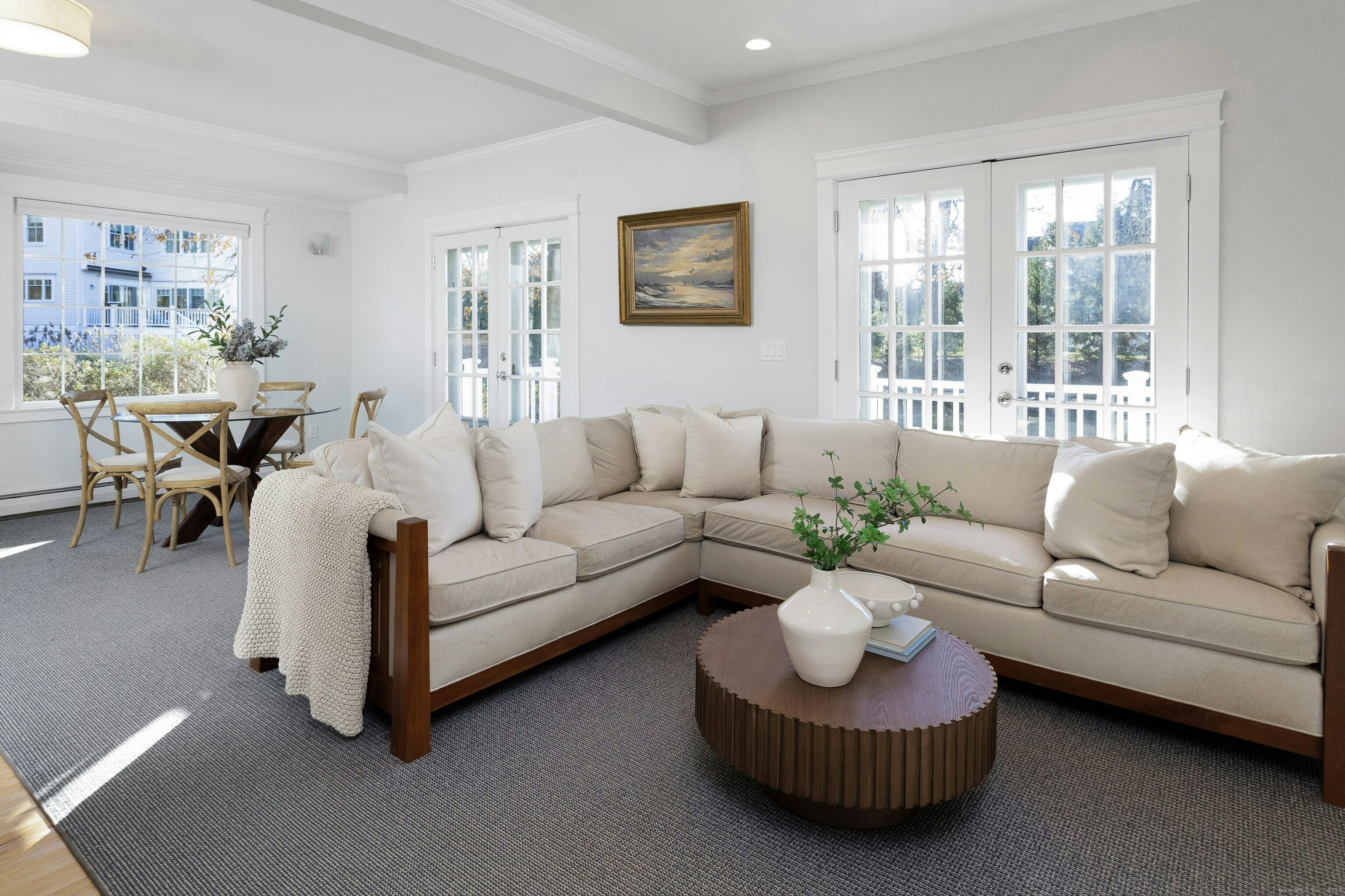 209 Rowayton Avenue Norwalk, CT 06853 - Photo 17 of 26 a living room with furniture and a large window