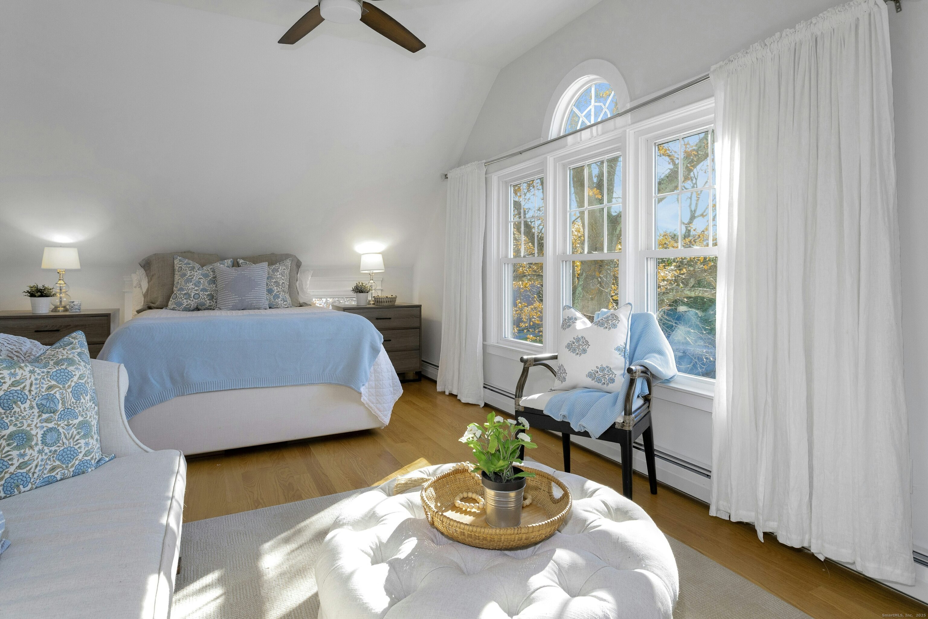 209 Rowayton Avenue Norwalk, CT 06853 - Photo 18 of 26 a living room with furniture and a window