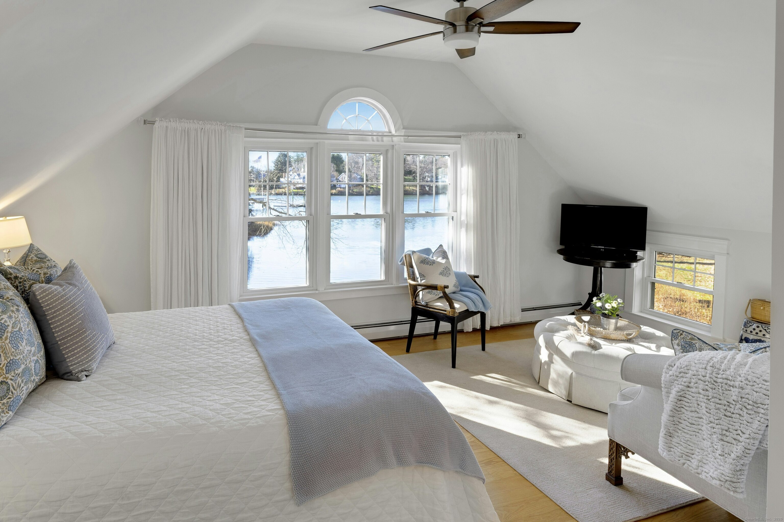 209 Rowayton Avenue Norwalk, CT 06853 - Photo 19 of 26 a living room with furniture and a flat screen tv