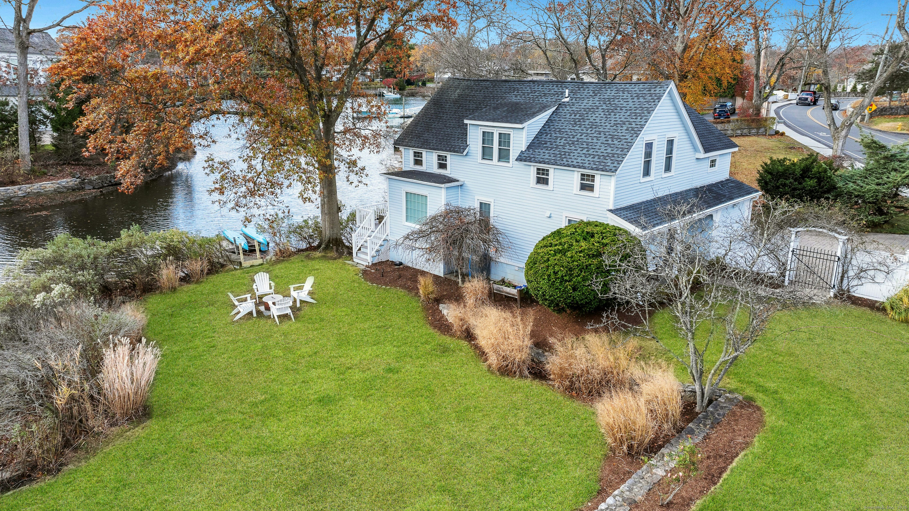 209 Rowayton Avenue Norwalk, CT 06853 - Photo 2 of 26 a aerial view of a house with a yard