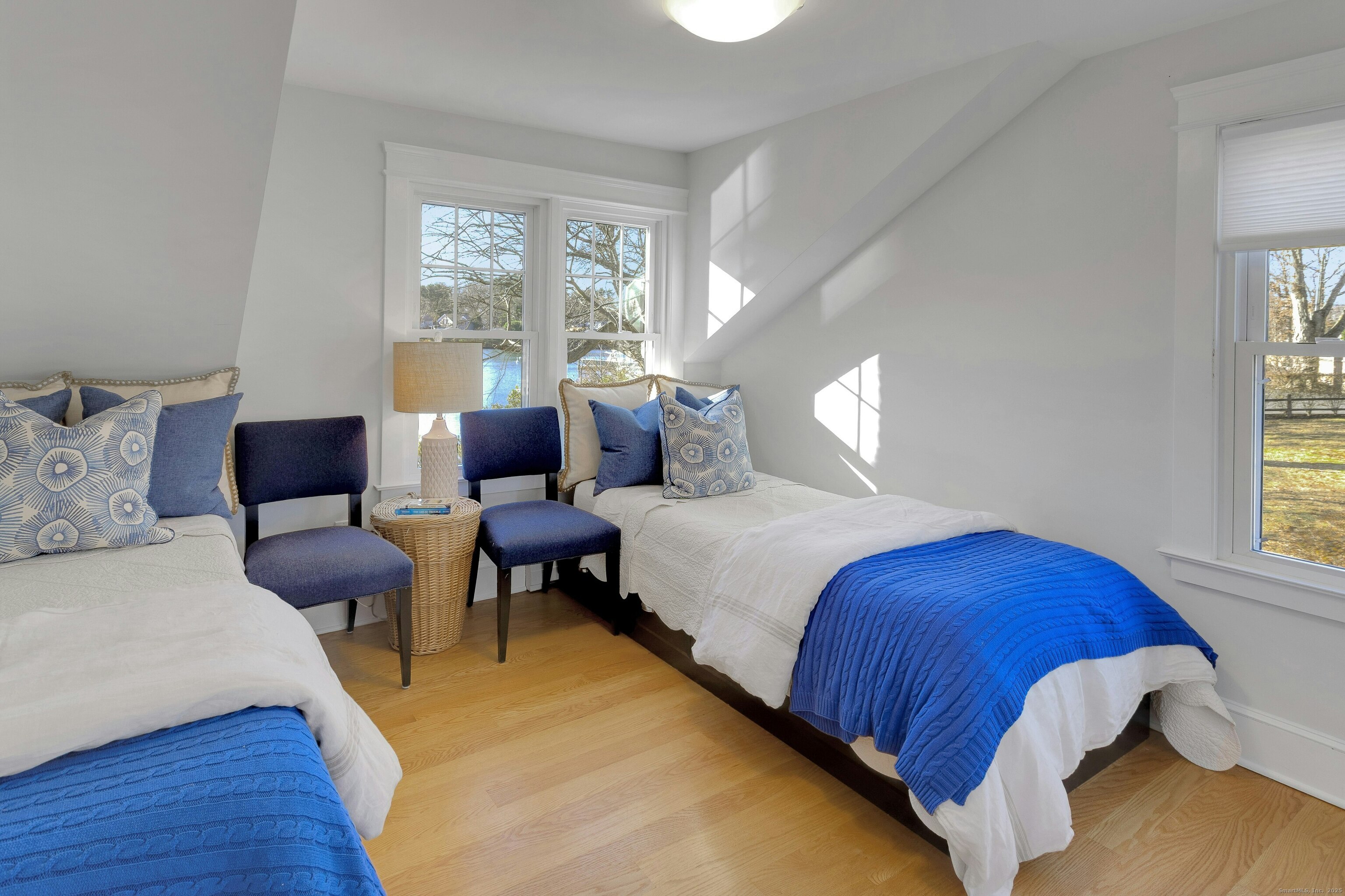 209 Rowayton Avenue Norwalk, CT 06853 - Photo 21 of 26 a bedroom with bed and window