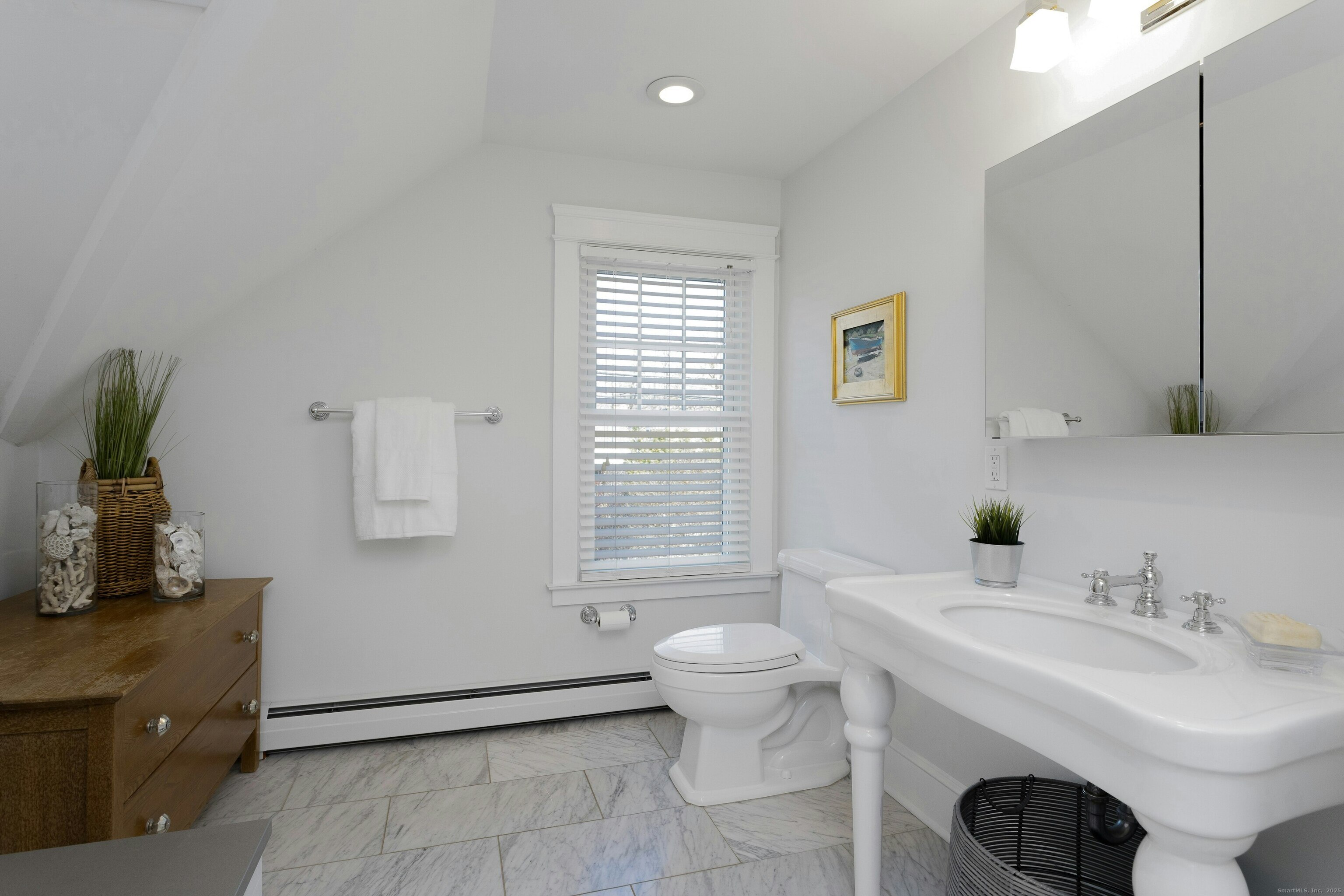 209 Rowayton Avenue Norwalk, CT 06853 - Photo 22 of 26 a bathroom with a sink toilet and shower