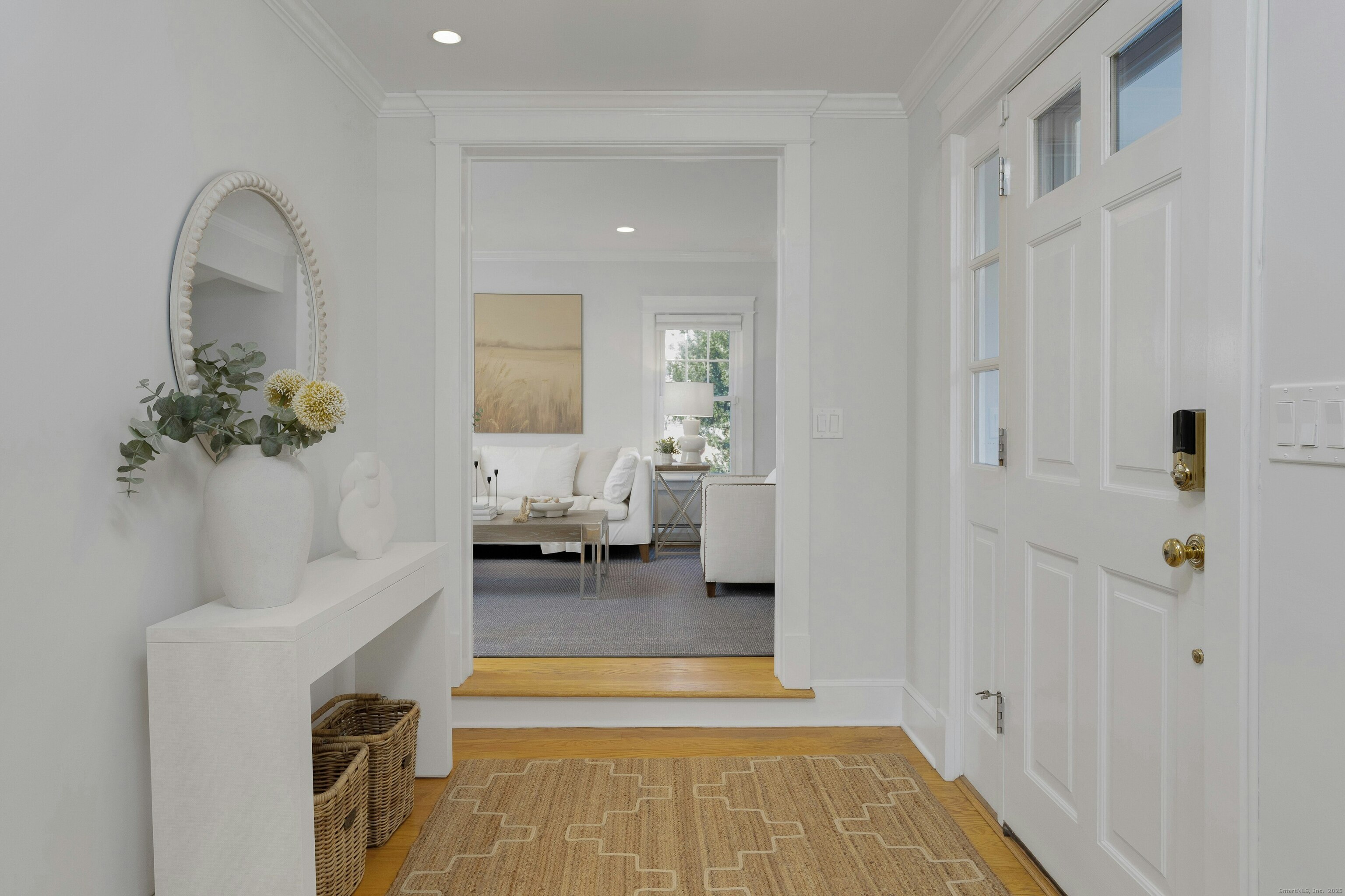 209 Rowayton Avenue Norwalk, CT 06853 - Photo 5 of 26 a living room with furniture and a fireplace