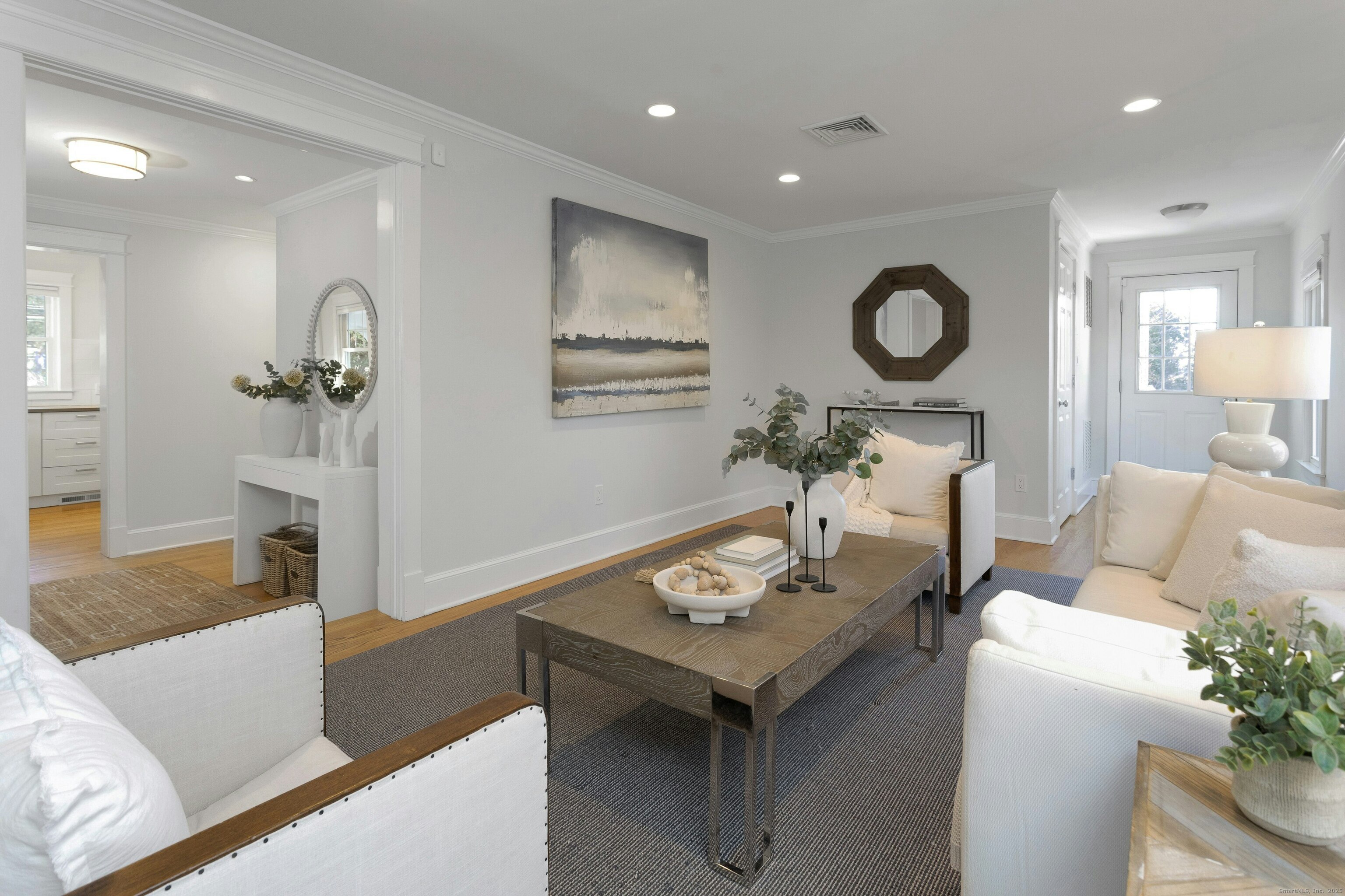 209 Rowayton Avenue Norwalk, CT 06853 - Photo 6 of 26 a living room with furniture and wooden floor