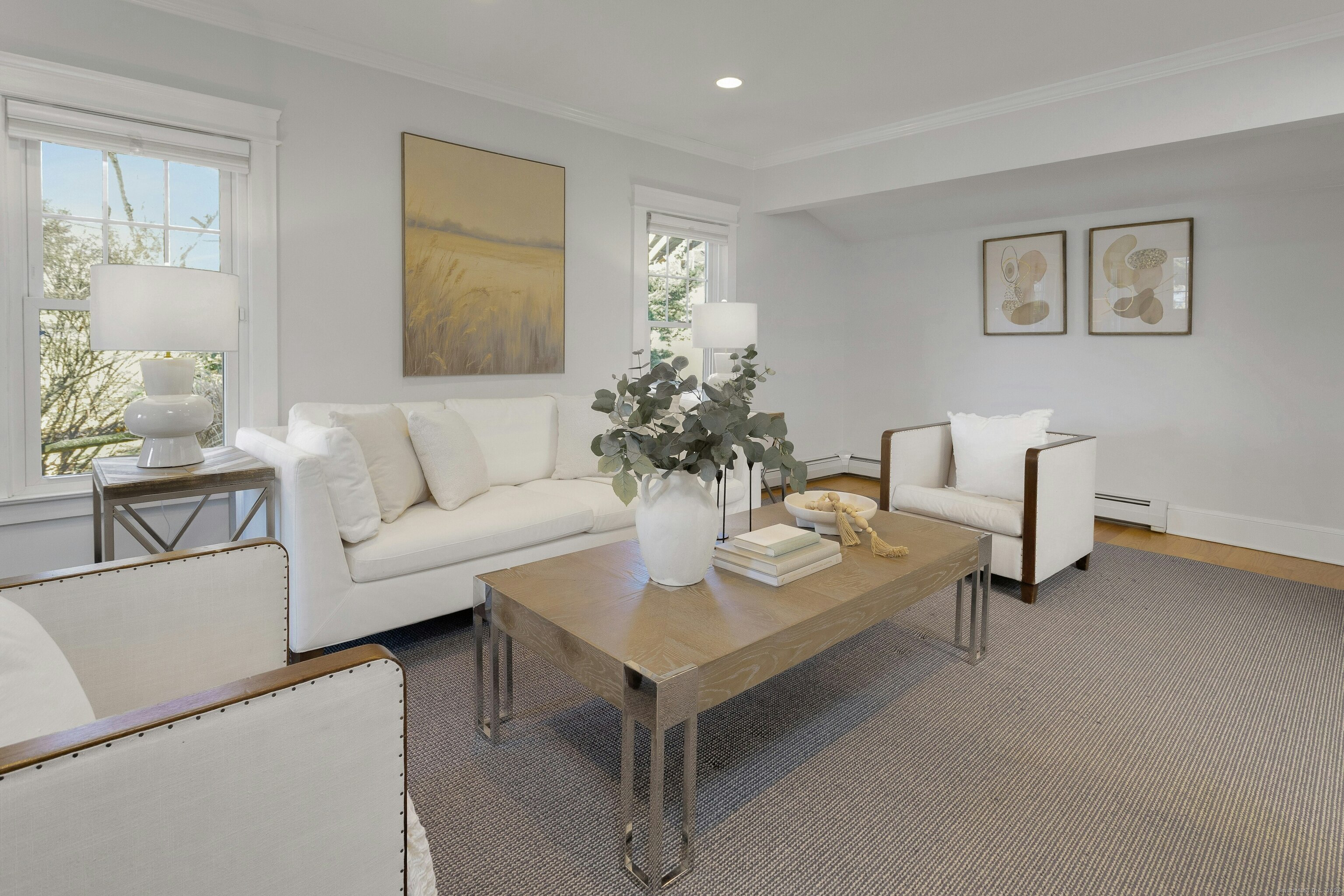 209 Rowayton Avenue Norwalk, CT 06853 - Photo 8 of 26 a living room with furniture and a potted plant