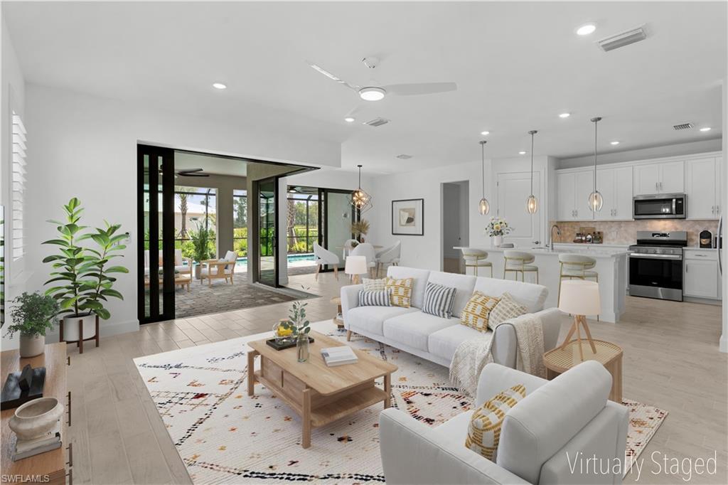 2104 Freemont Way Naples, FL 34119 - Photo 2 of 27 Large open area virtually staged