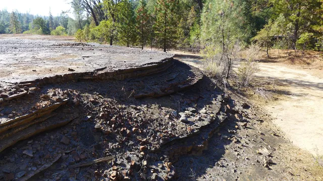 a stone house with a outdoor space