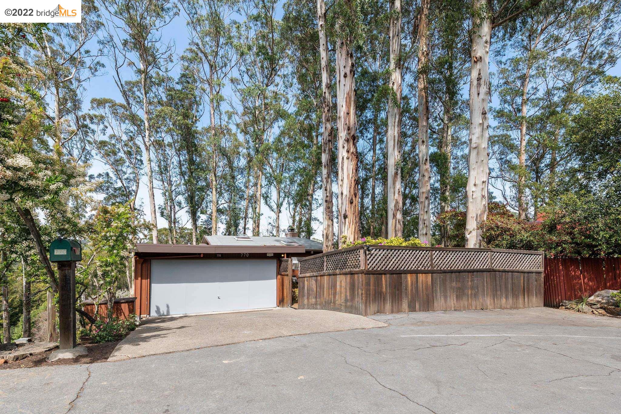 770 Wildcat Canyon Road Berkeley, CA 94708 - Photo 1 of 1 a view of entrance gate and trees