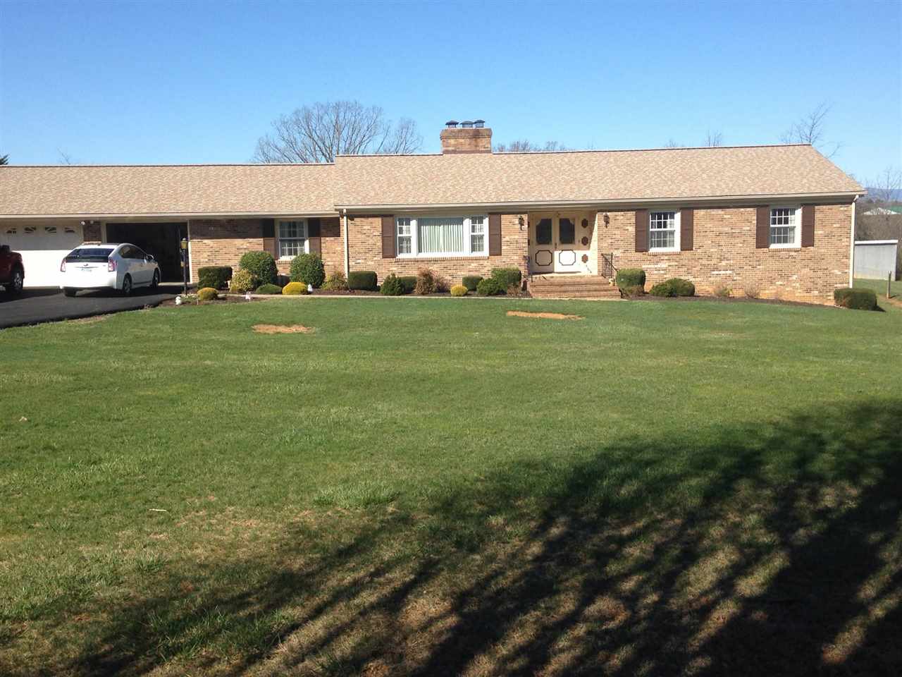 197 Augusta Farms Road Waynesboro, VA 22980 - Photo 1 of 10 a front view of a house with a garden