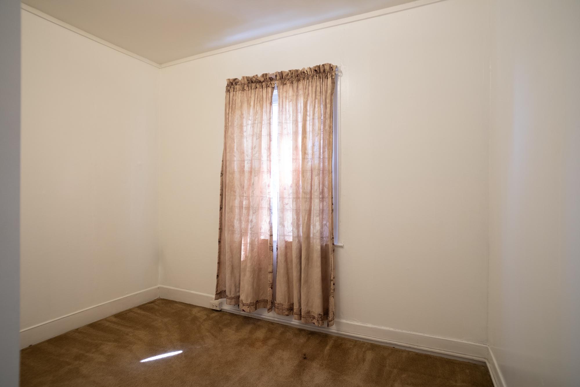 413 Rosecroft Terrace Baltimore, MD 21229 - Photo 14 of 21 an empty room with a door