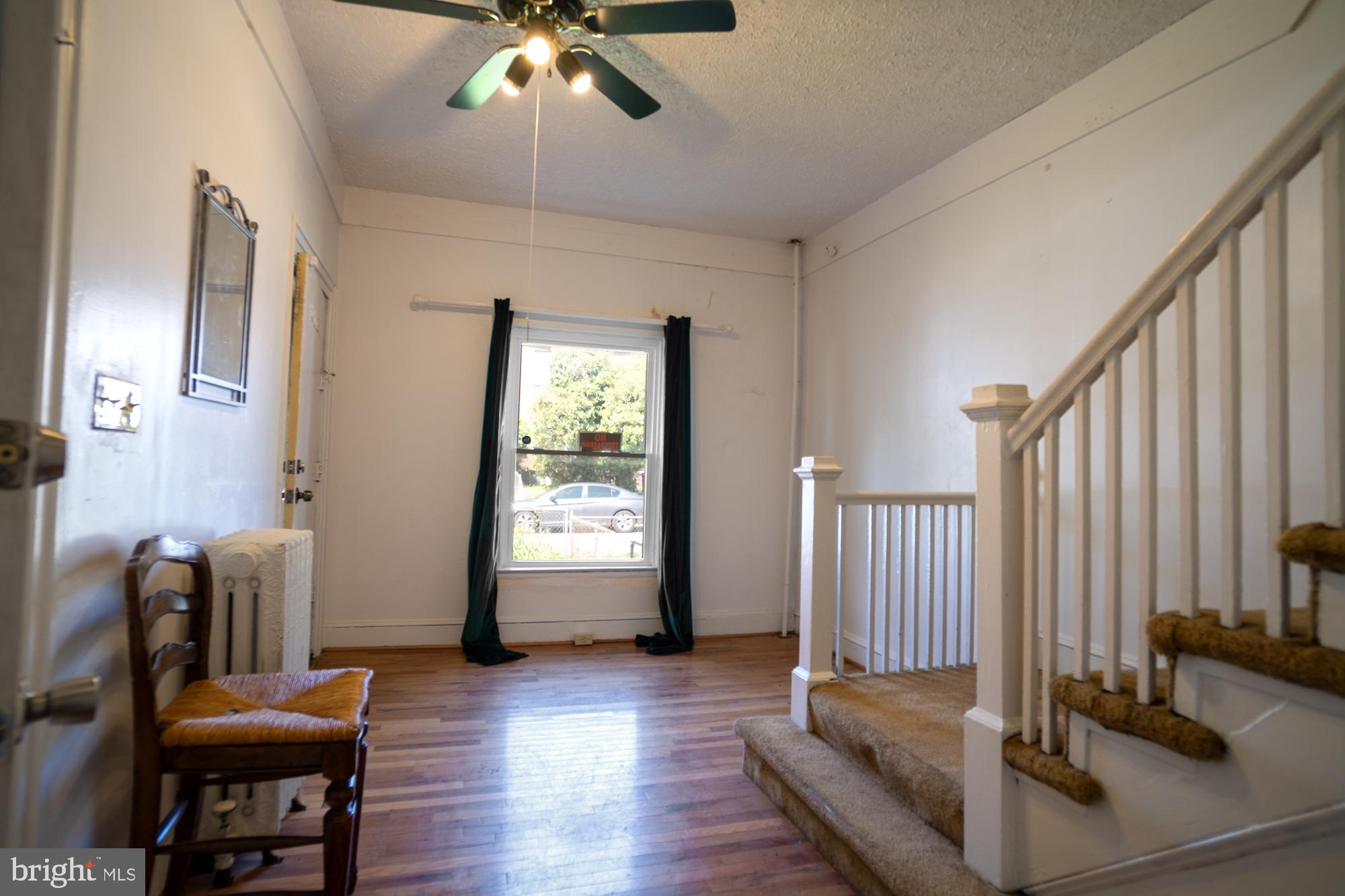 413 Rosecroft Terrace Baltimore, MD 21229 - Photo 4 of 21 workspace with wooden floor and windows