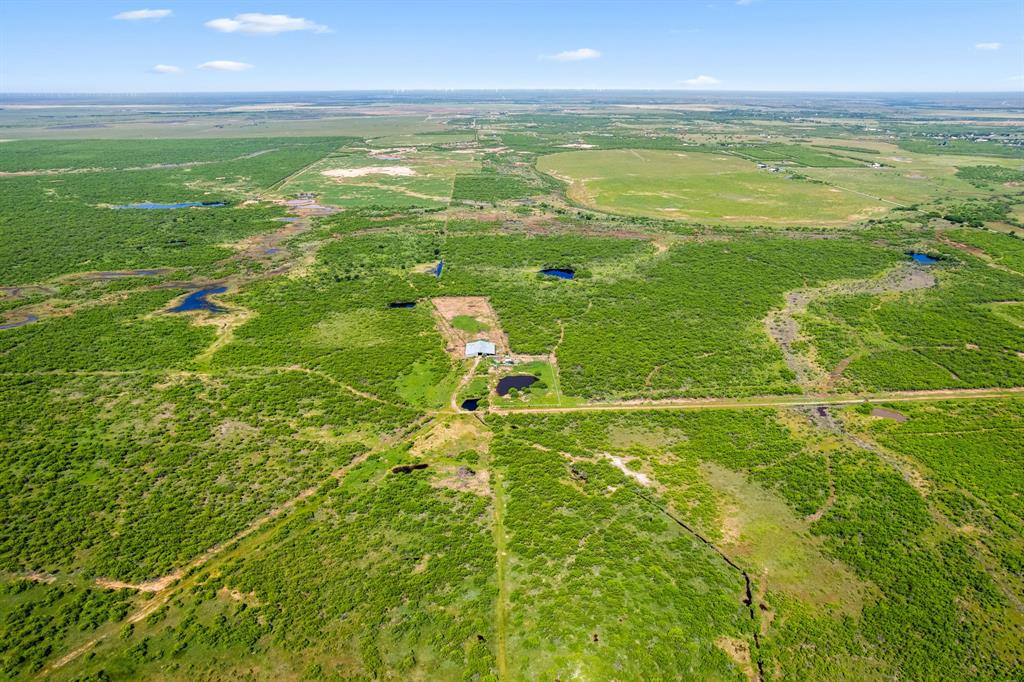 6213 Headquarters Road Iowa Park, TX 76367 - Photo 14 of 34 a view of a tennis court