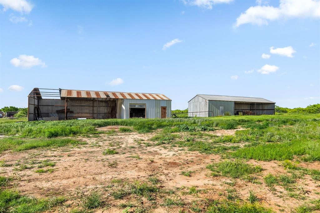 6213 Headquarters Road Iowa Park, TX 76367 - Photo 25 of 34 a front view of a house with a yard
