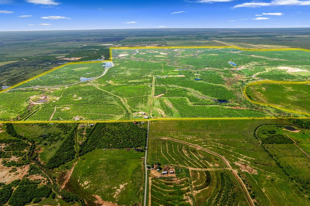6213 Headquarters Road Iowa Park, TX 76367 - Photo 29 of 34 a view of an outdoor space and a yard