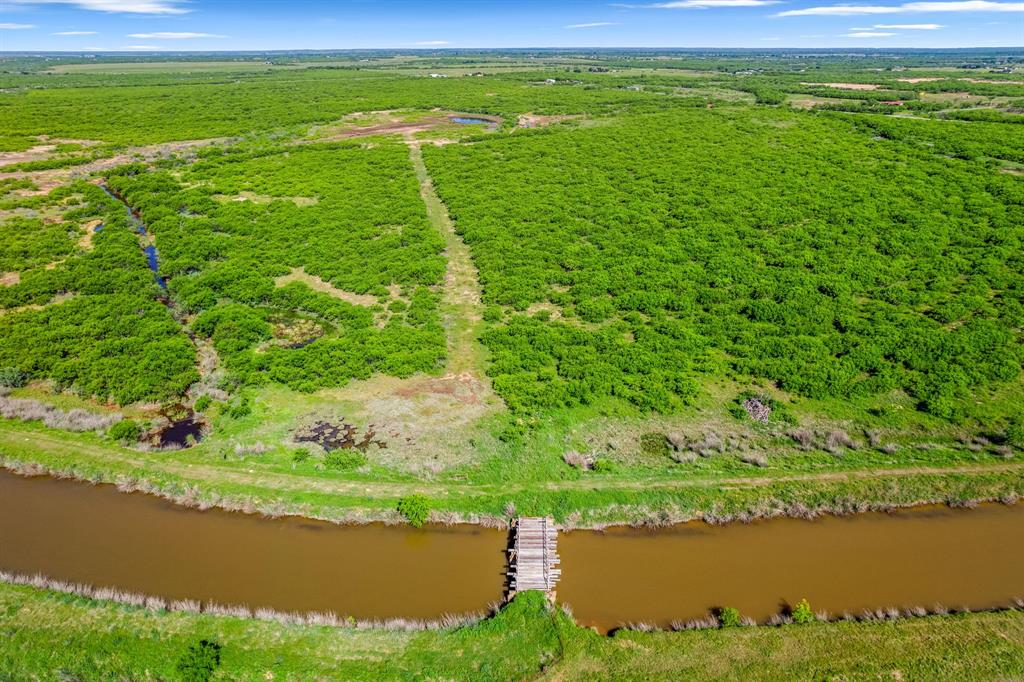 6213 Headquarters Road Iowa Park, TX 76367 - Photo 32 of 34 a view of a lake with a outdoor space