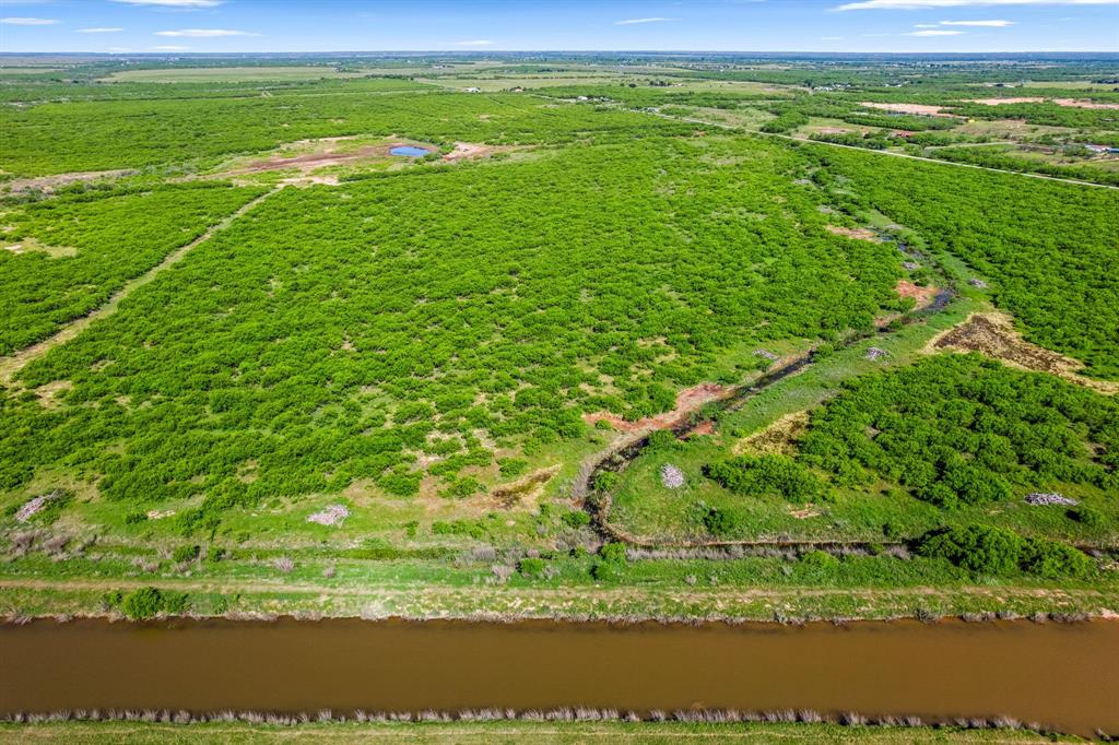 6213 Headquarters Road Iowa Park, TX 76367 - Photo 33 of 34 a view of a yard with an outdoor space