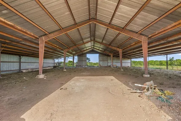 a view of a room with wooden walls