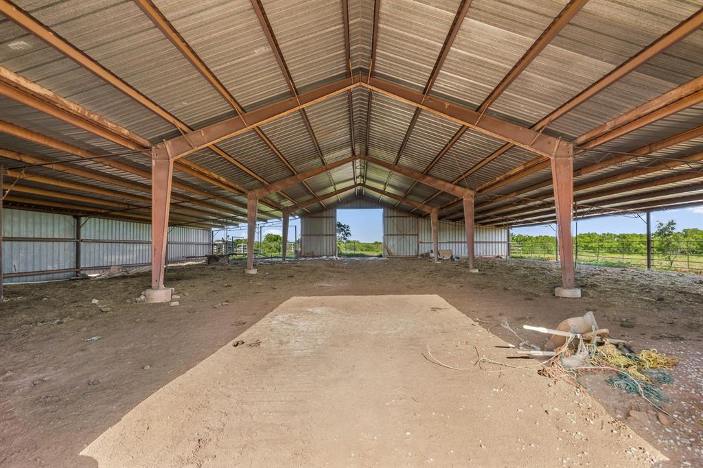 6213 Headquarters Road Iowa Park, TX 76367 - Photo 7 of 34 a view of a room with wooden walls