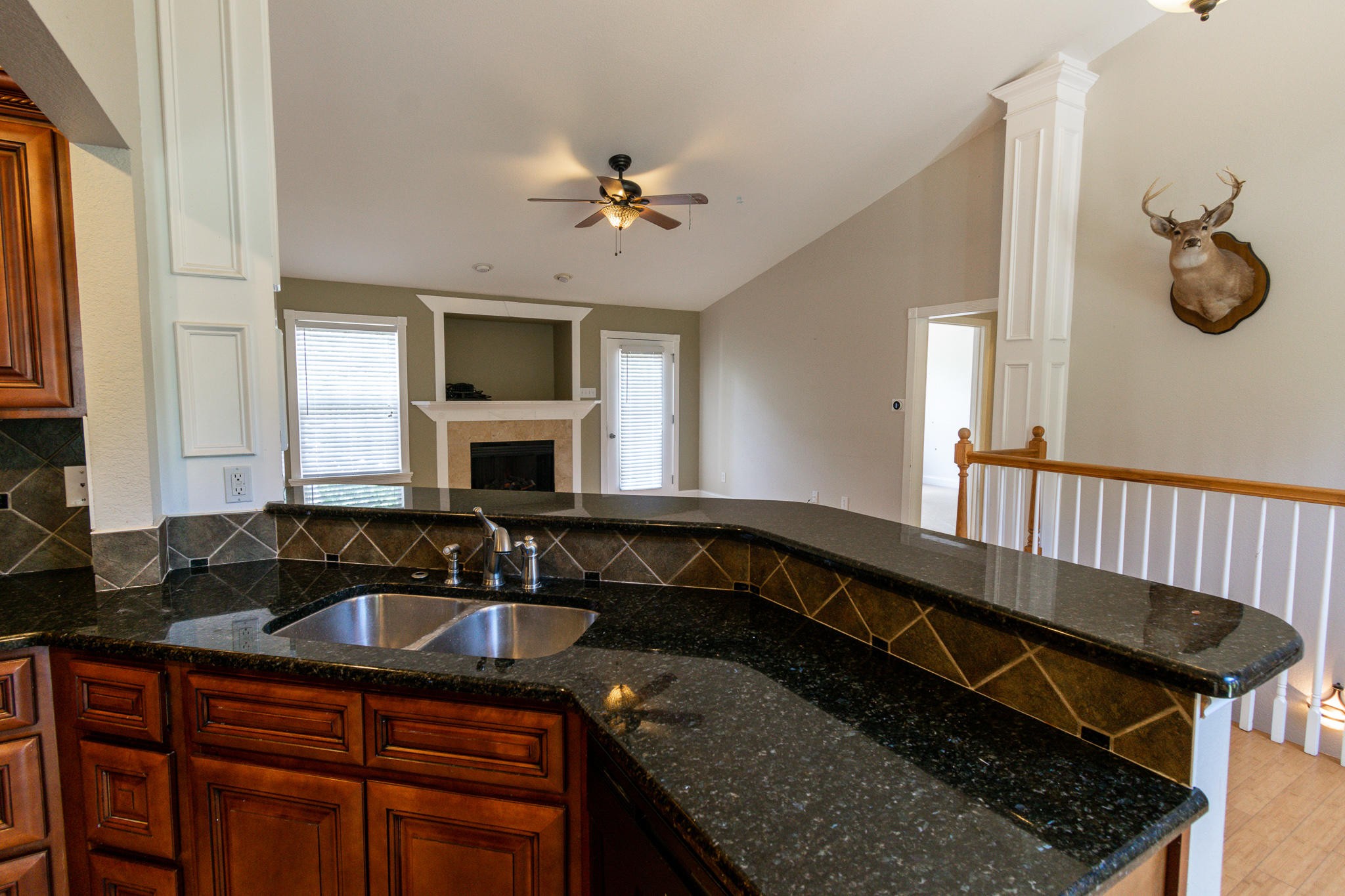 3328 Shagbark Road Powell, TN 37849 - Photo 6 of 32 a kitchen with granite countertop a sink stainless steel appliances and cabinets