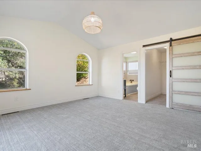 a view of a room with racks on the wall