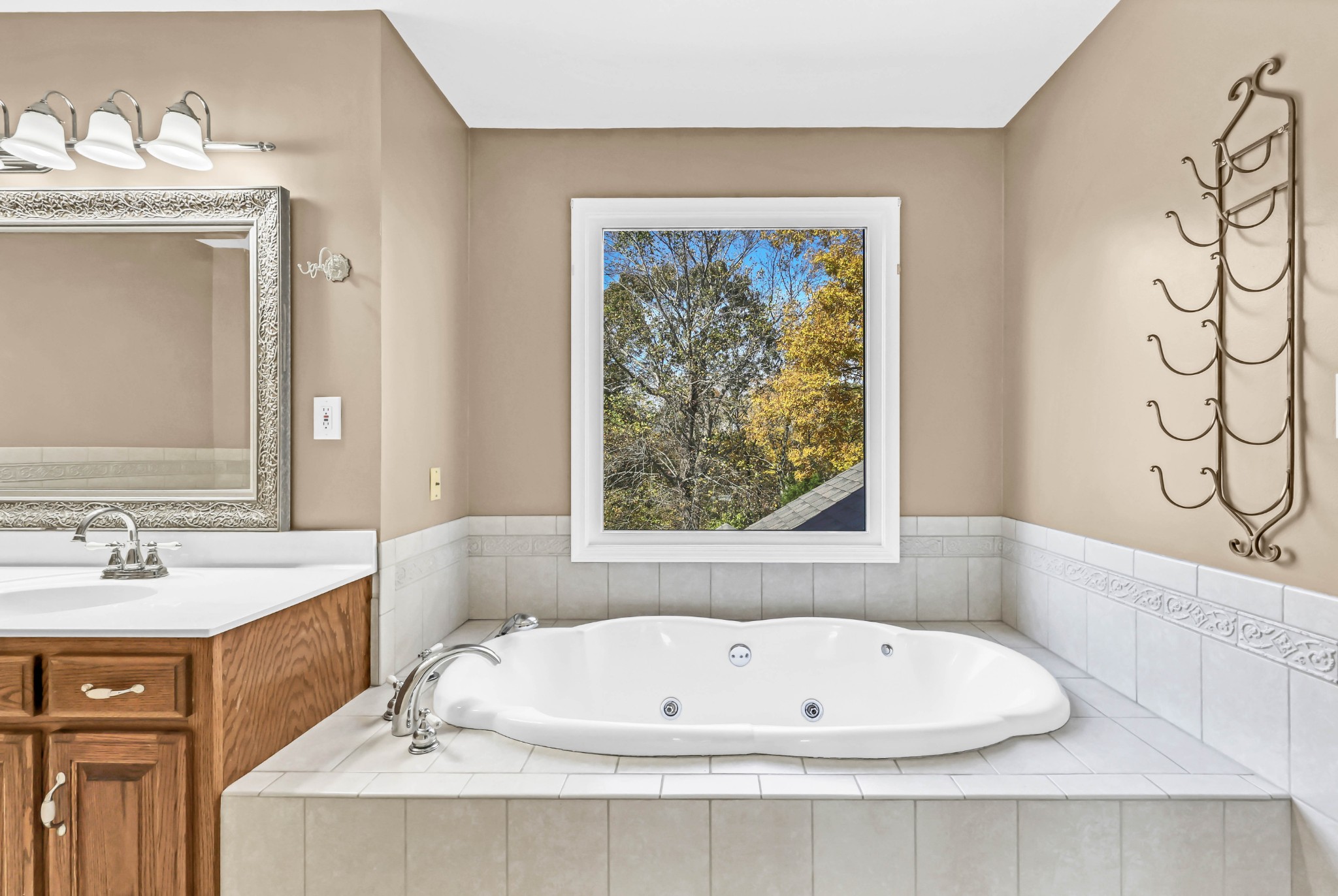 2753 Jarrell Ridge Road Clarksville, TN 37043 - Photo 27 of 80 a white bath tub sitting next to a white sink