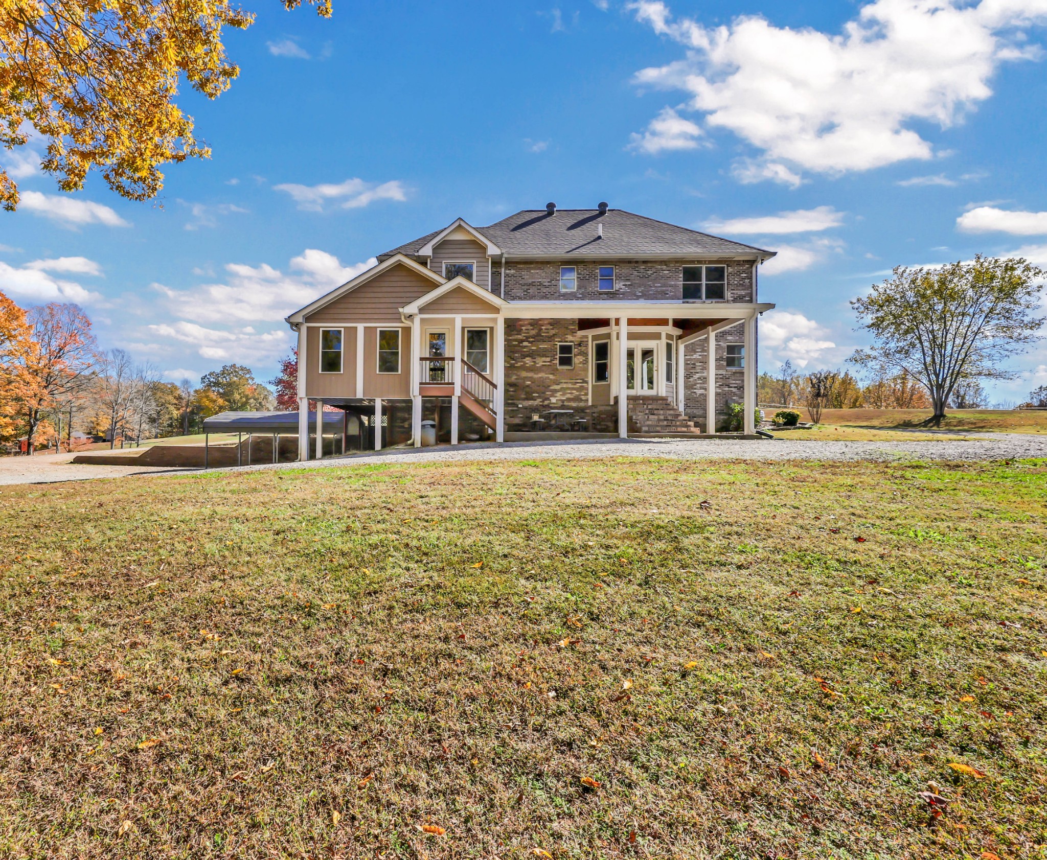 2753 Jarrell Ridge Road Clarksville, TN 37043 - Photo 54 of 80 a front view of a house with a garden