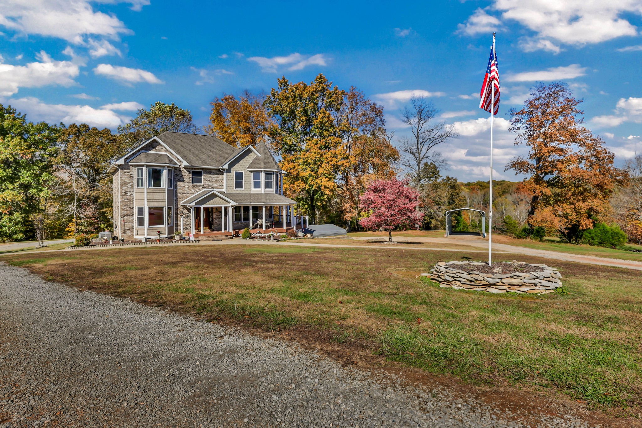 2753 Jarrell Ridge Road Clarksville, TN 37043 - Photo 6 of 80 a front view of a house with a yard
