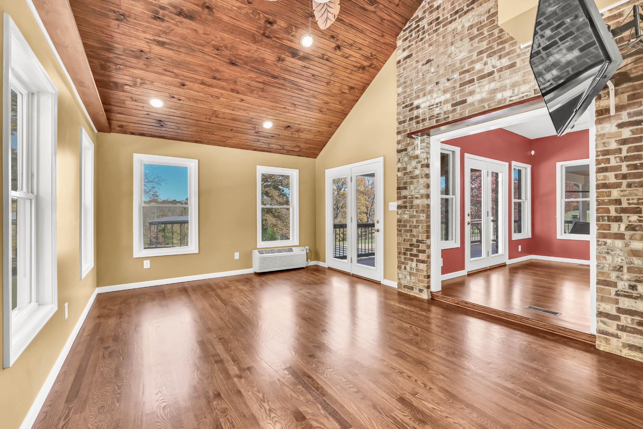 2753 Jarrell Ridge Road Clarksville, TN 37043 - Photo 9 of 80 a view of an empty room with wooden floor and a window