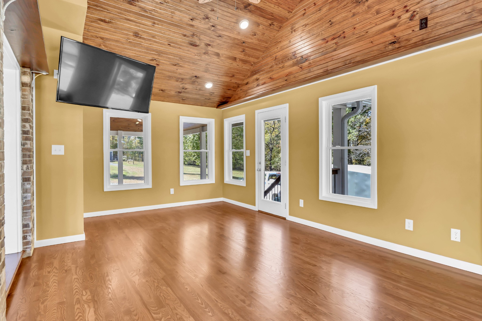 2753 Jarrell Ridge Road Clarksville, TN 37043 - Photo 10 of 80 a view of an empty room with wooden floor and a window
