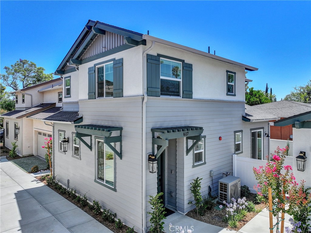 a front view of a house with garage