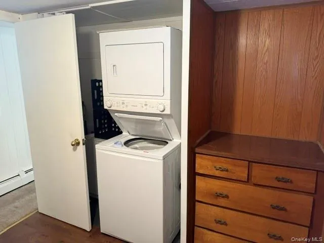 a view of a bathroom with a shower and a toilet