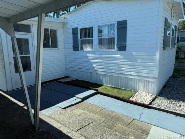 a view of a house with swimming pool