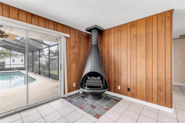 a kitchen with granite countertop a stove sink and cabinets