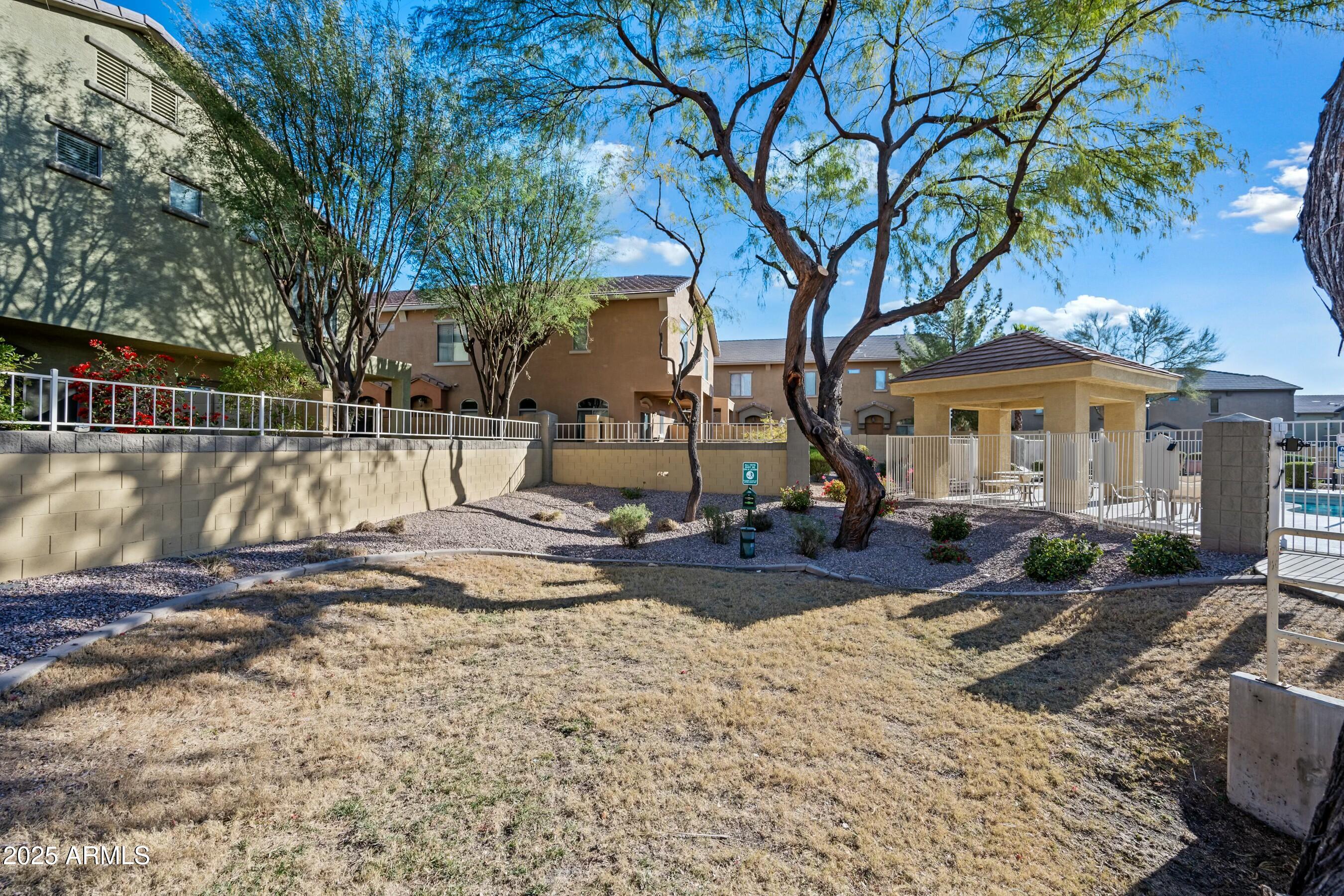 2150 East Bell Road, Unit 1130 Phoenix, AZ 85022 - Photo 31 of 39 a view of a house with snow on the floor