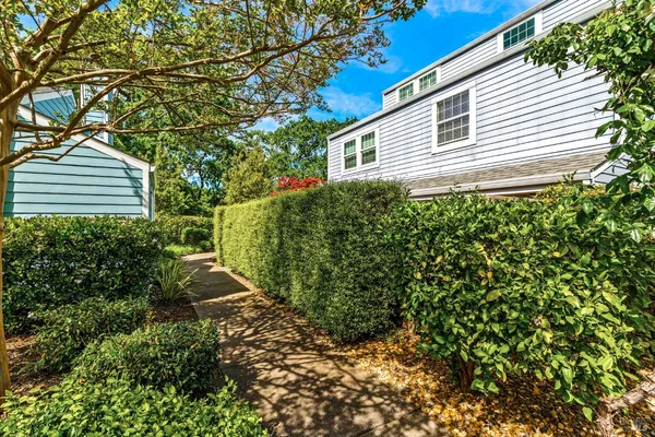 a house view with a backyard space
