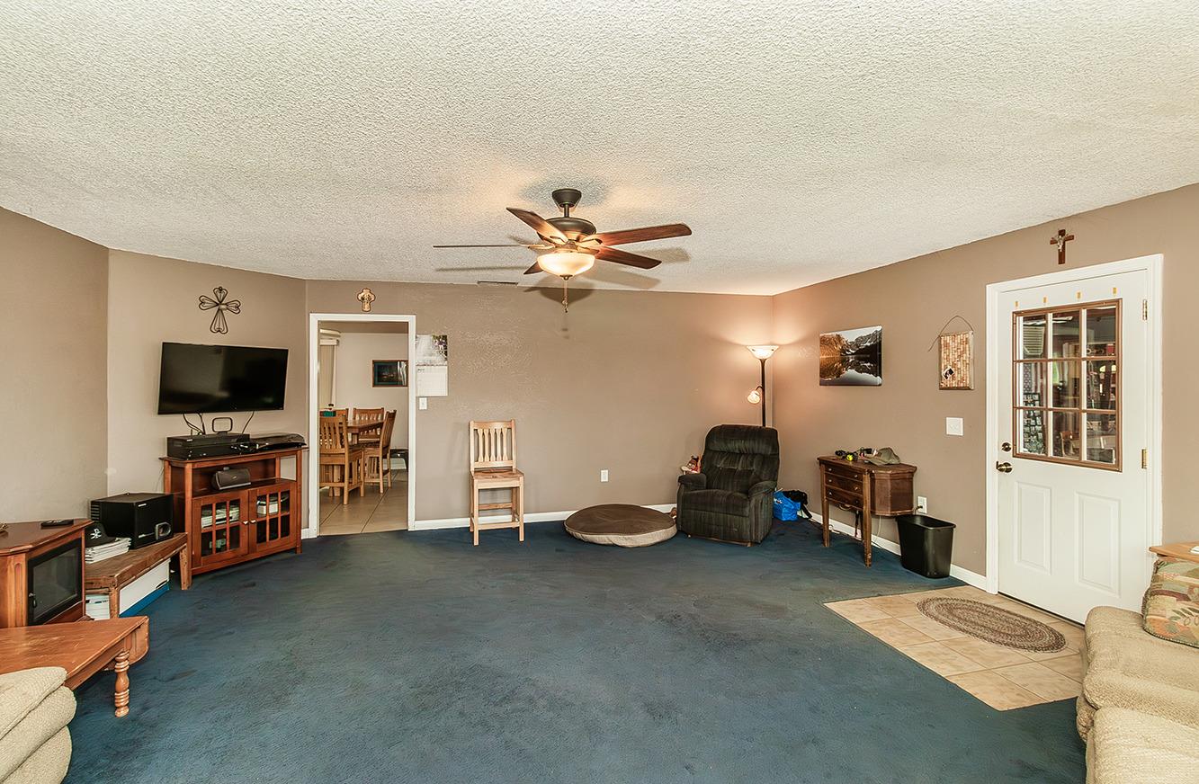 29979 Post Oak Road Tollhouse, CA 93667 - Photo 17 of 42 a living room with furniture and a flat screen tv