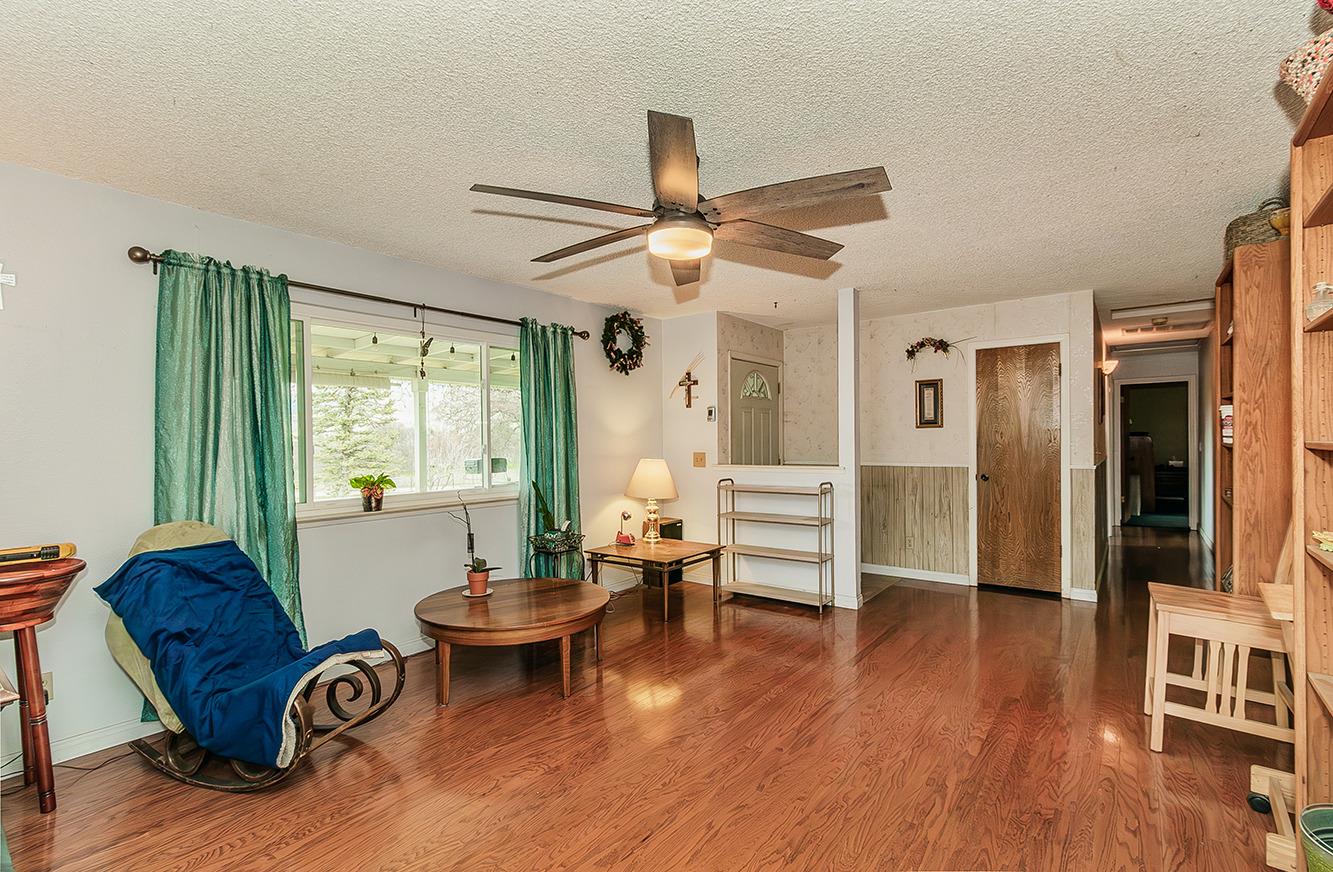 29979 Post Oak Road Tollhouse, CA 93667 - Photo 20 of 42 a living room with furniture a table and a large window