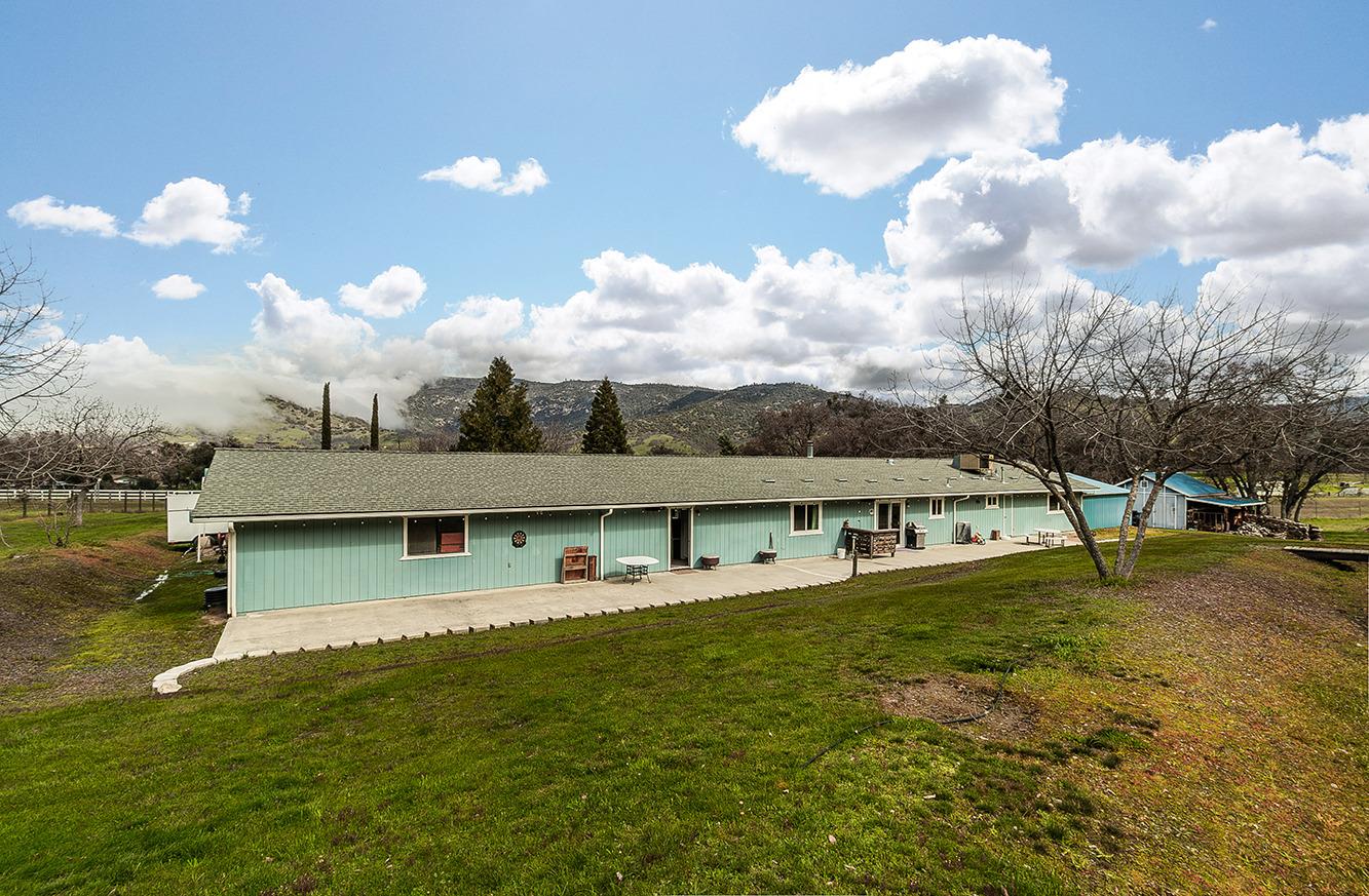 29979 Post Oak Road Tollhouse, CA 93667 - Photo 8 of 42 a view of a house with a backyard