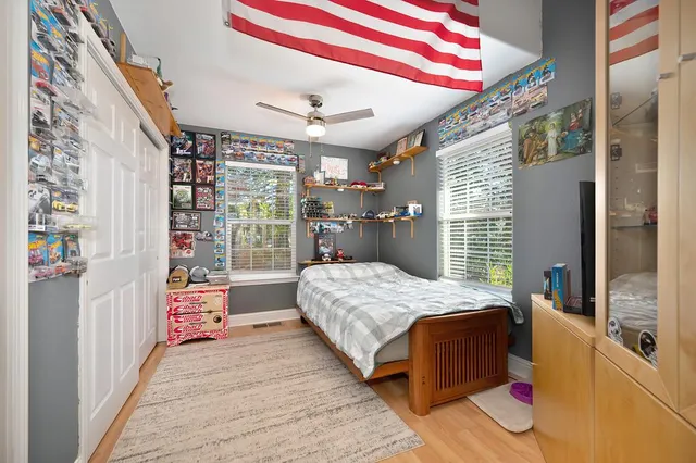 a view of balcony with wooden floor
