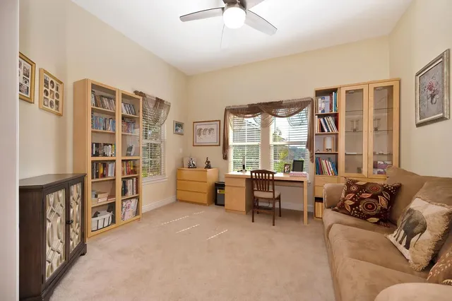 a view of a balcony with wooden floor and lake view