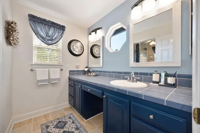 an aerial view of house with yard