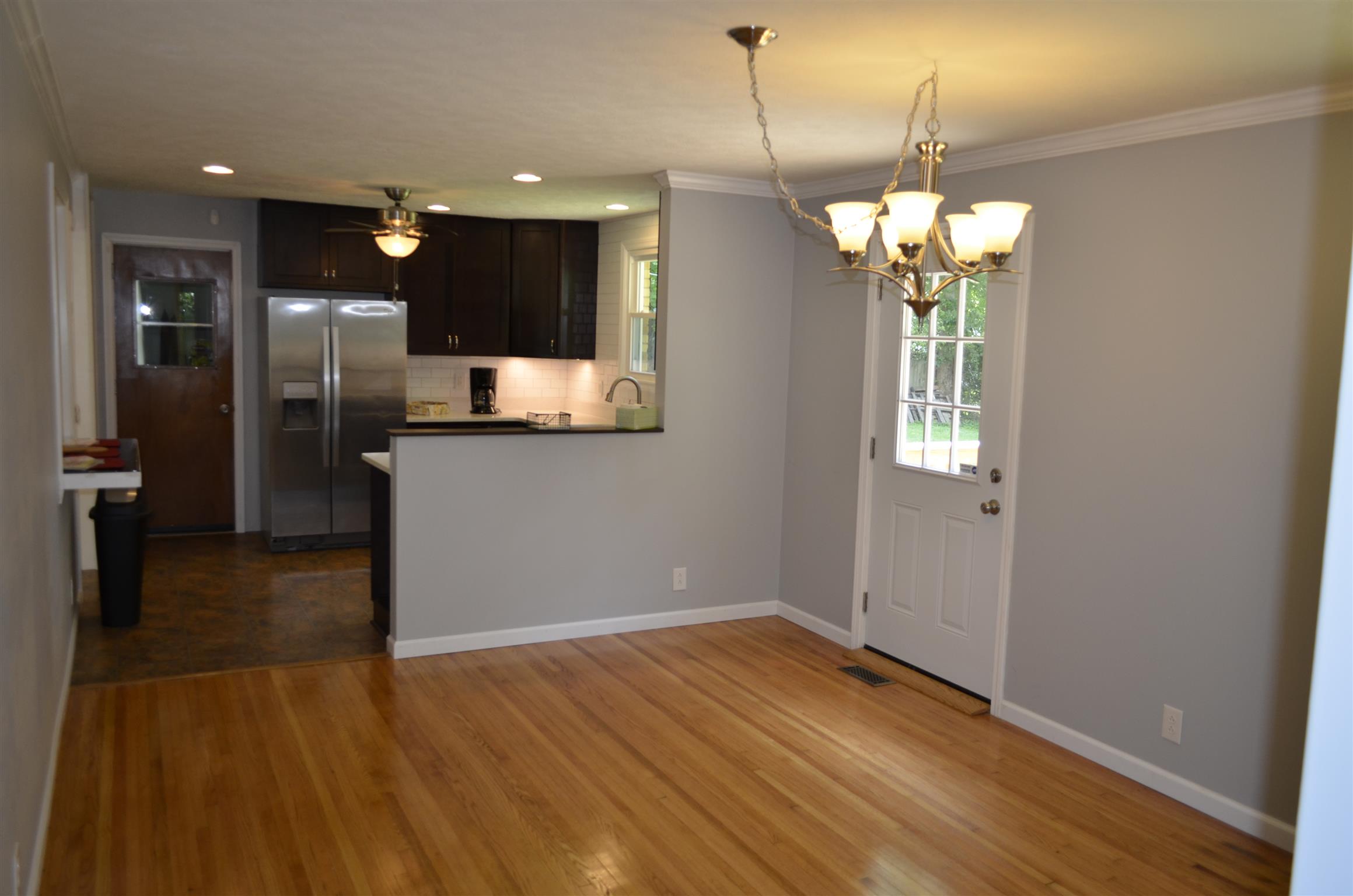 312 Burch Road Clarksville, TN 37042 - Photo 12 of 22 a view of a kitchen with a sink and wooden floor