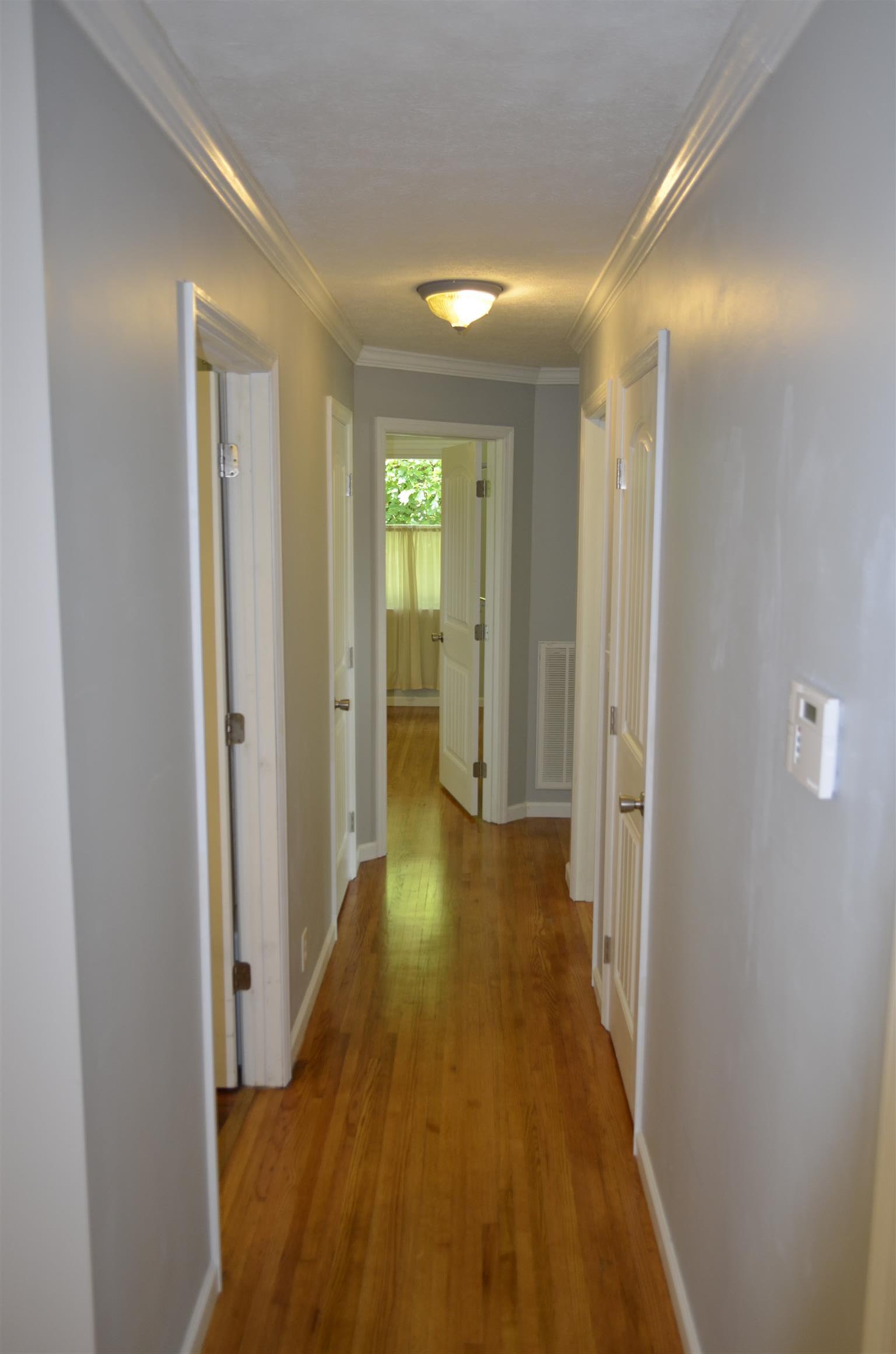 312 Burch Road Clarksville, TN 37042 - Photo 14 of 22 a view of a hallway with wooden floor