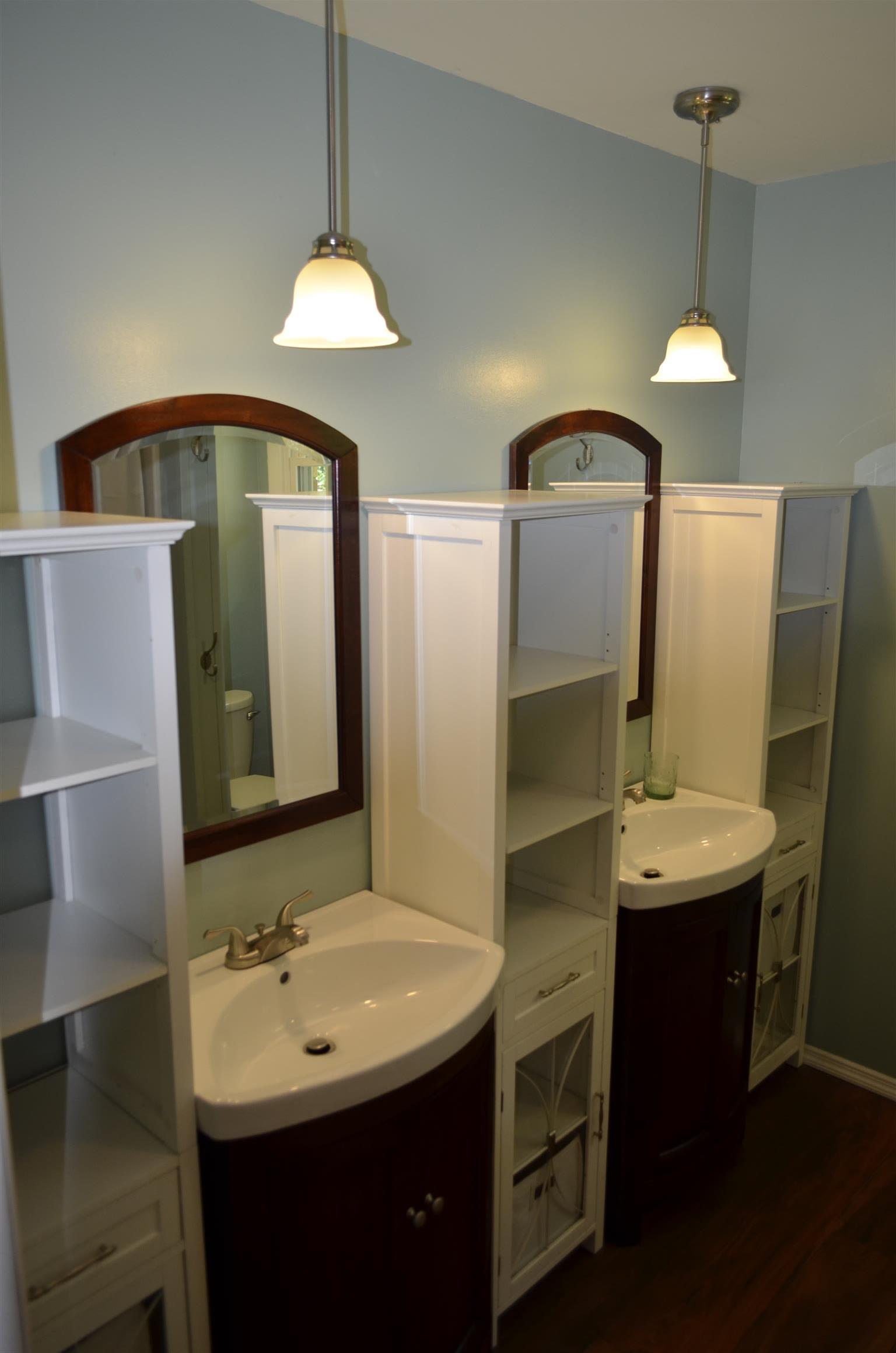 312 Burch Road Clarksville, TN 37042 - Photo 15 of 22 a bathroom with a sink double vanity and a mirror