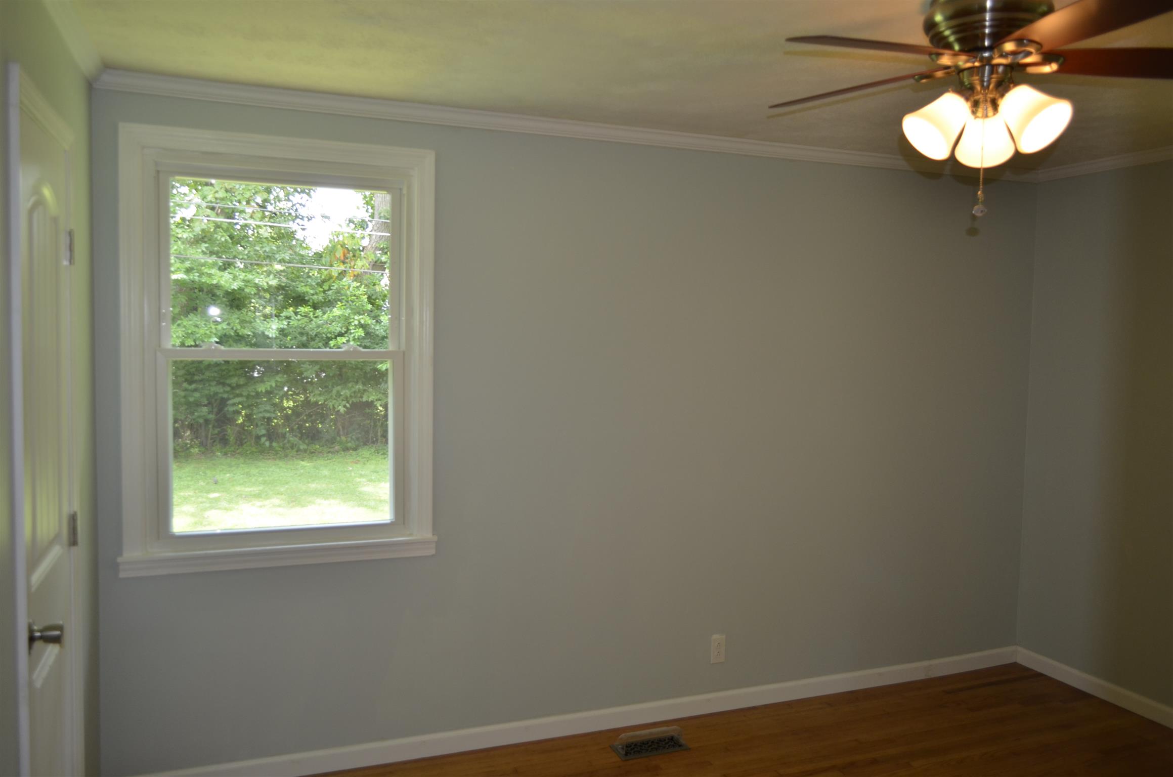 312 Burch Road Clarksville, TN 37042 - Photo 17 of 22 a view of wooden floor and windows in a room