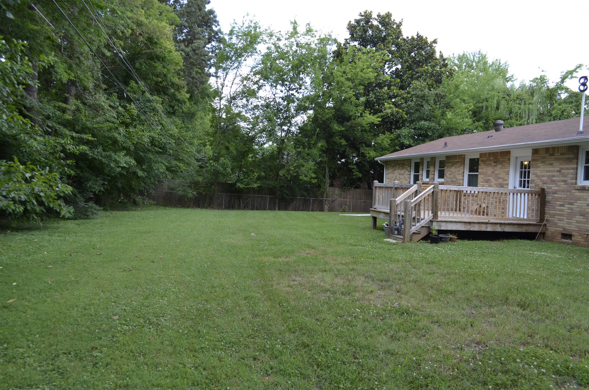 312 Burch Road Clarksville, TN 37042 - Photo 2 of 22 a view of a house with backyard and garden