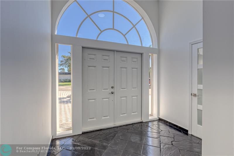 5709 Bamboo Circle Tamarac, FL 33319 - Photo 20 of 47 a view of entryway with a front door