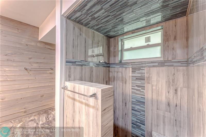 5709 Bamboo Circle Tamarac, FL 33319 - Photo 26 of 47 a view of walk in closet with window