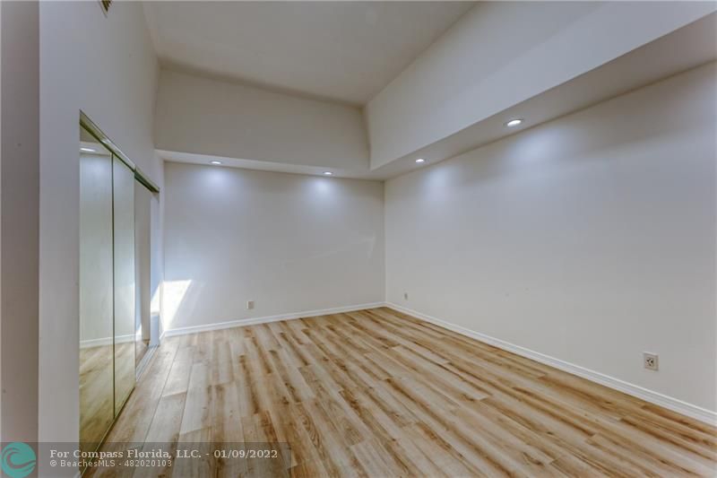 5709 Bamboo Circle Tamarac, FL 33319 - Photo 33 of 47 a view of empty room with wooden floor